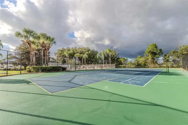 an aerial view of residential house with outdoor space and street view