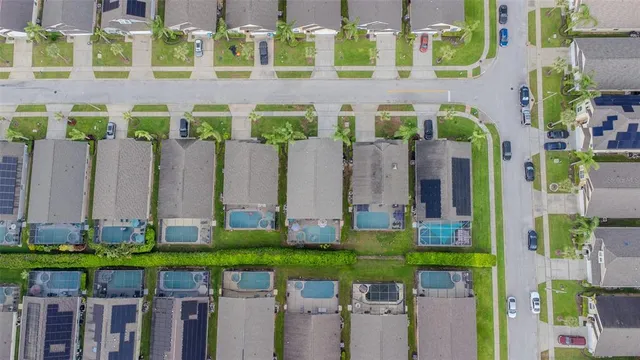 a view of a chairs in a backyard