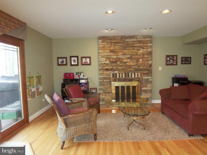 1226 Blue Mt Road Monkton, MD 21111 - Photo 11 of 30 a living room with furniture and a fireplace