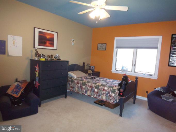 1226 Blue Mt Road Monkton, MD 21111 - Photo 13 of 30 a bedroom with a bed and window