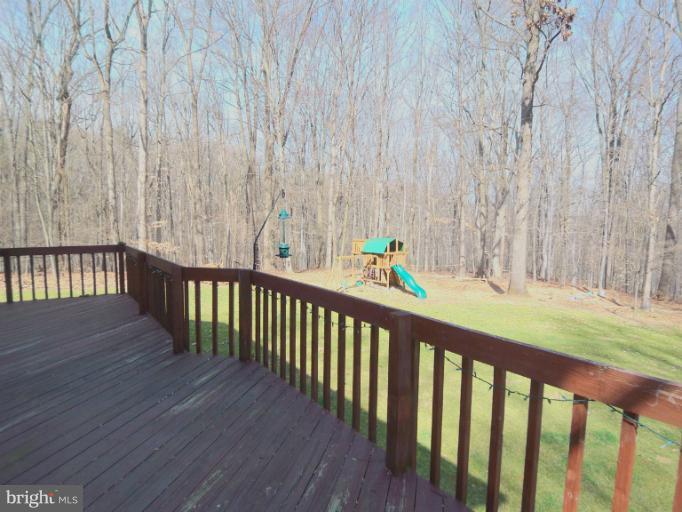 1226 Blue Mt Road Monkton, MD 21111 - Photo 3 of 30 a view of balcony with wooden floor