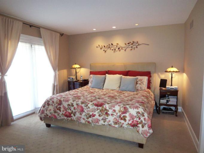 1226 Blue Mt Road Monkton, MD 21111 - Photo 25 of 30 a bedroom with a bed and a table