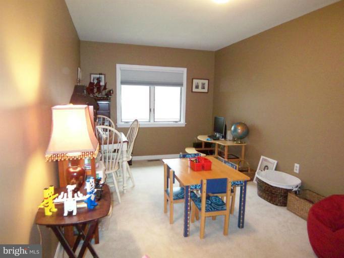 1226 Blue Mt Road Monkton, MD 21111 - Photo 29 of 30 a living room with furniture and a table