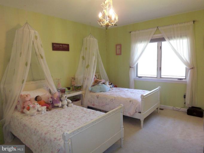 1226 Blue Mt Road Monkton, MD 21111 - Photo 7 of 30 a bedroom with 2 bed and a window