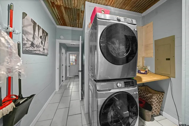 a utility room with dryer and washer
