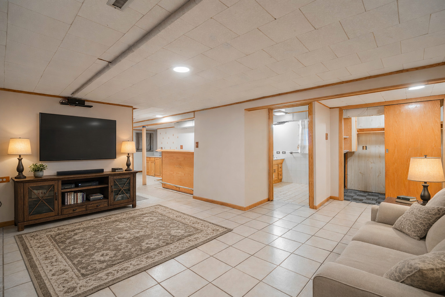 5250 South Nagle Avenue Chicago, IL 60638 - Photo 13 of 21 a living room with furniture and a flat screen tv