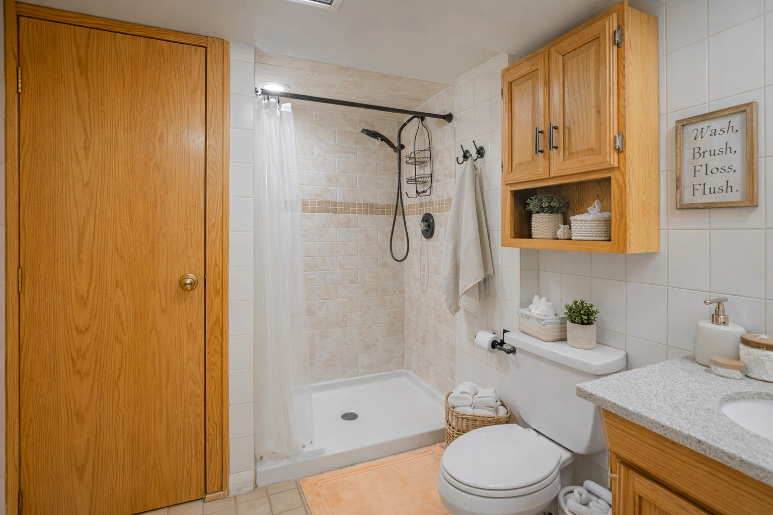 5250 South Nagle Avenue Chicago, IL 60638 - Photo 15 of 21 a bathroom with a shower a toilet and a sink