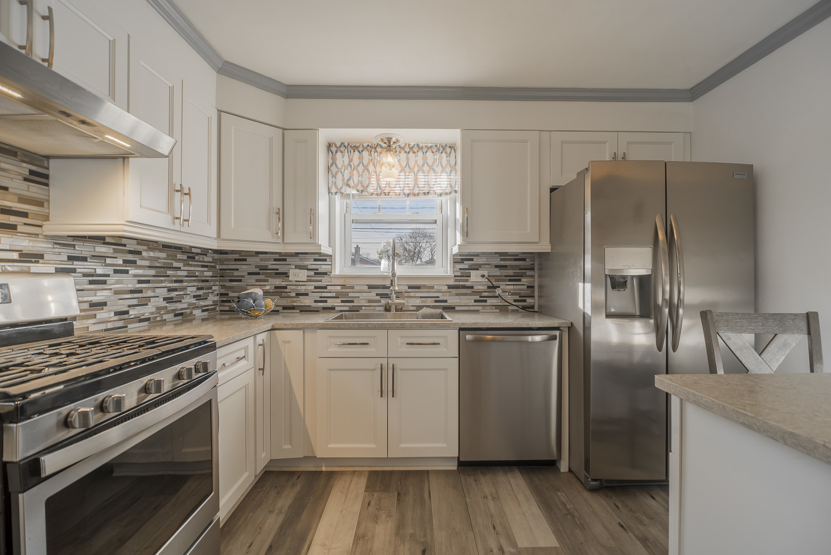 5250 South Nagle Avenue Chicago, IL 60638 - Photo 2 of 21 a kitchen with stainless steel appliances granite countertop a stove a sink and a refrigerator