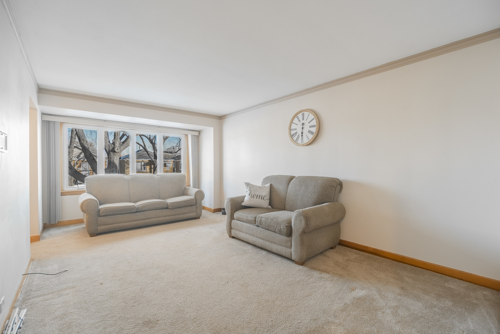 5250 South Nagle Avenue Chicago, IL 60638 - Photo 6 of 21 a living room with furniture and a window