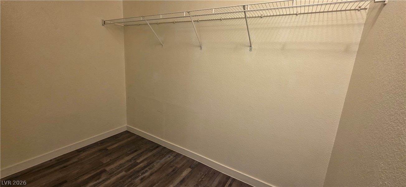 1830 North Pecos Road, Unit 142 Las Vegas, NV 89115 - Photo 15 of 19 Ample closet space with practical shelving awaits organization.
