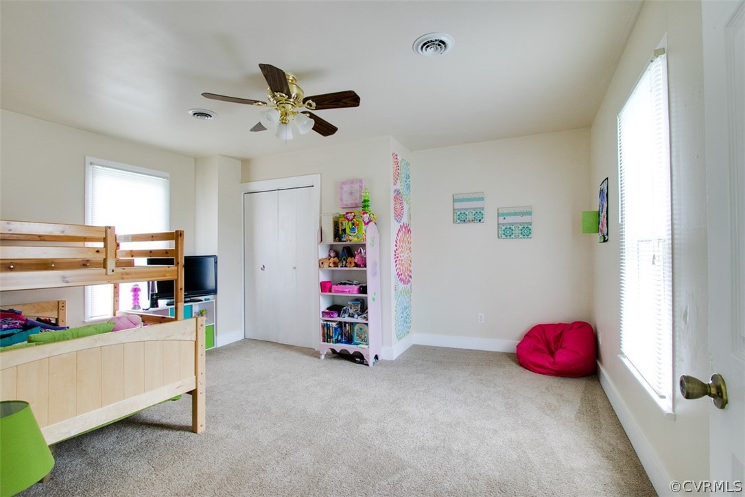 11501 Winterpock Road Chesterfield, VA 23838 - Photo 17 of 30 a view of a livingroom with furniture and a ceiling fan