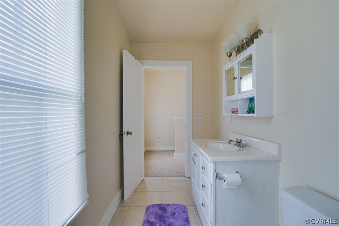 11501 Winterpock Road Chesterfield, VA 23838 - Photo 19 of 30 a bathroom with a sink and mirror