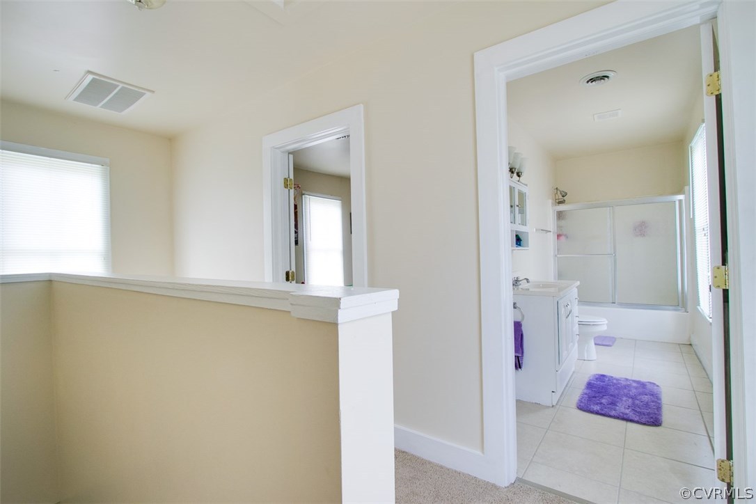 11501 Winterpock Road Chesterfield, VA 23838 - Photo 21 of 30 a bathroom with a granite countertop shower sink and mirror