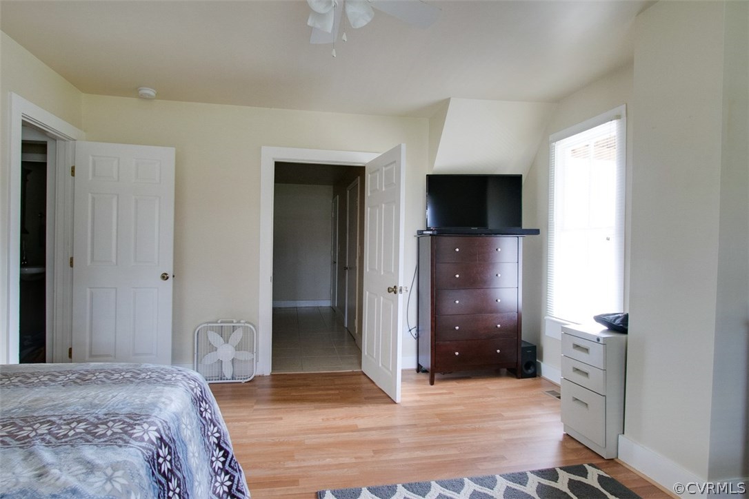 11501 Winterpock Road Chesterfield, VA 23838 - Photo 24 of 30 a bedroom with a bed and a flat screen tv