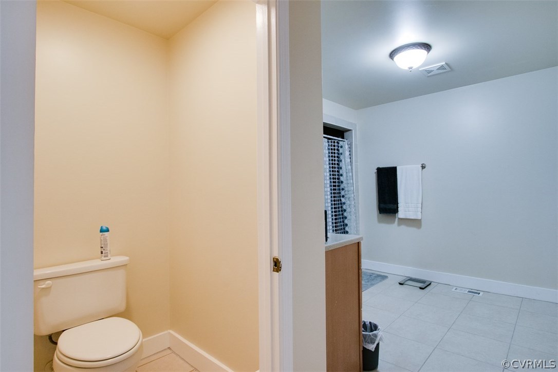 11501 Winterpock Road Chesterfield, VA 23838 - Photo 27 of 30 a bathroom with a toilet and a sink