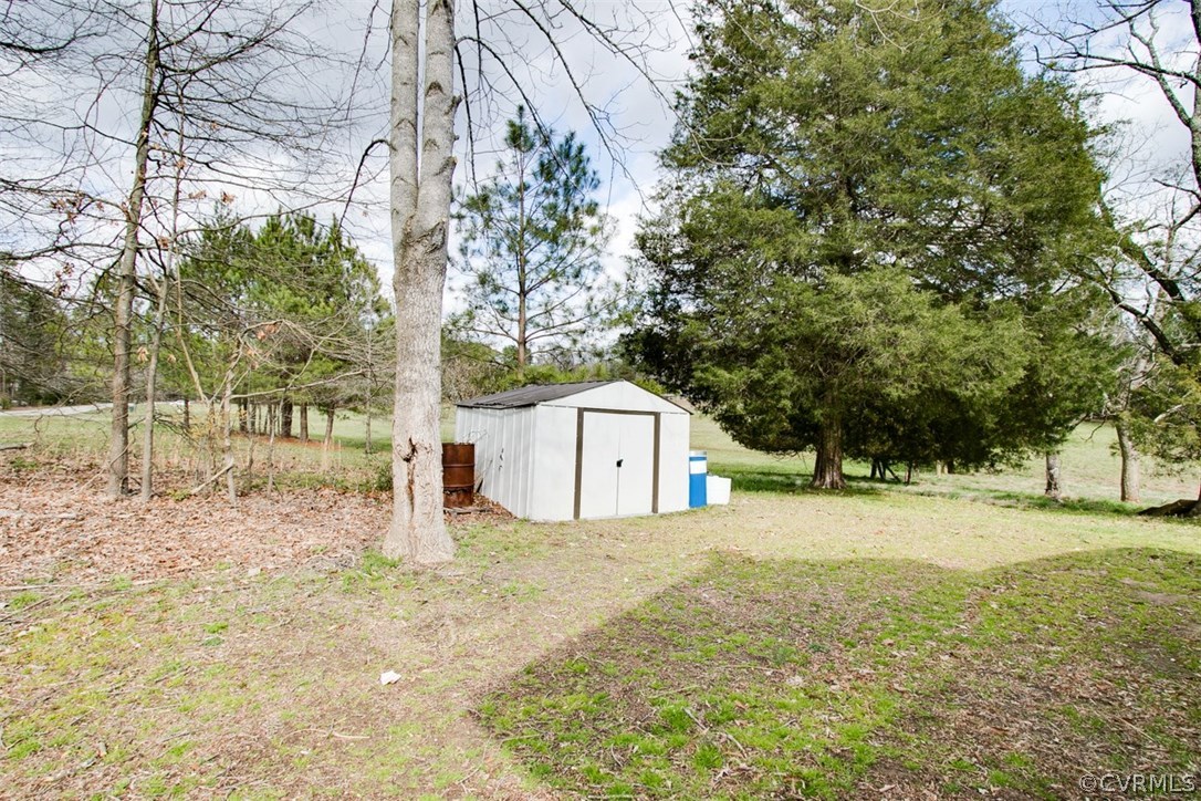 11501 Winterpock Road Chesterfield, VA 23838 - Photo 29 of 30 a white house that has a tree in front of it