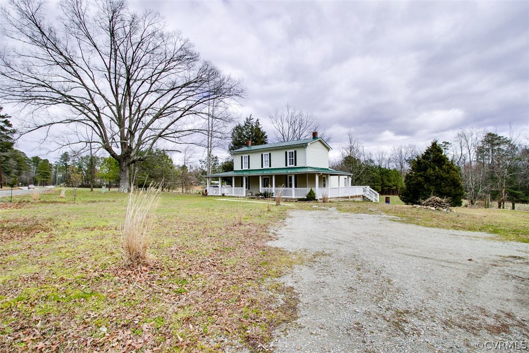 11501 Winterpock Road Chesterfield, VA 23838 - Photo 30 of 30 a view of a house with pool and trees in the background