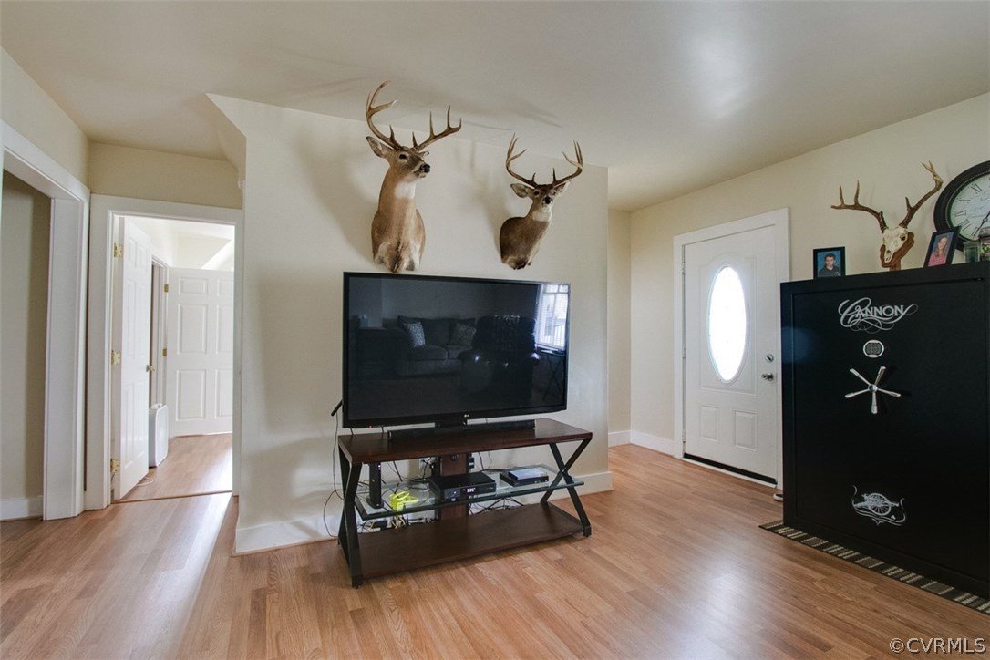 11501 Winterpock Road Chesterfield, VA 23838 - Photo 7 of 30 a living room with furniture and a flat screen tv