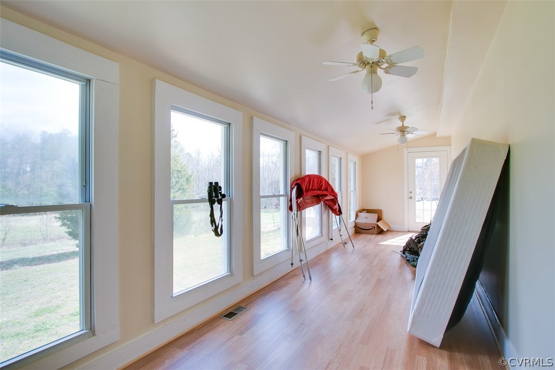 11501 Winterpock Road Chesterfield, VA 23838 - Photo 8 of 30 a view of a hallway to a livingroom and a chandelier