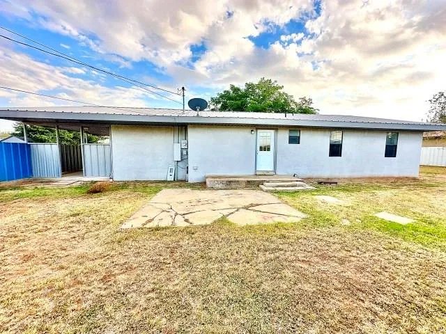 a house view with a swimming pool
