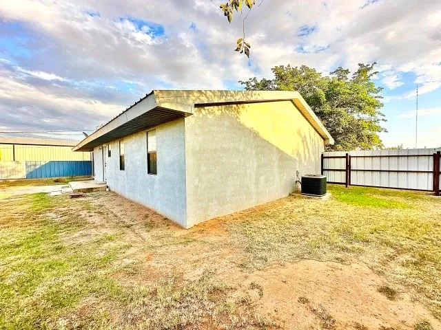 a view of a house with a swimming pool