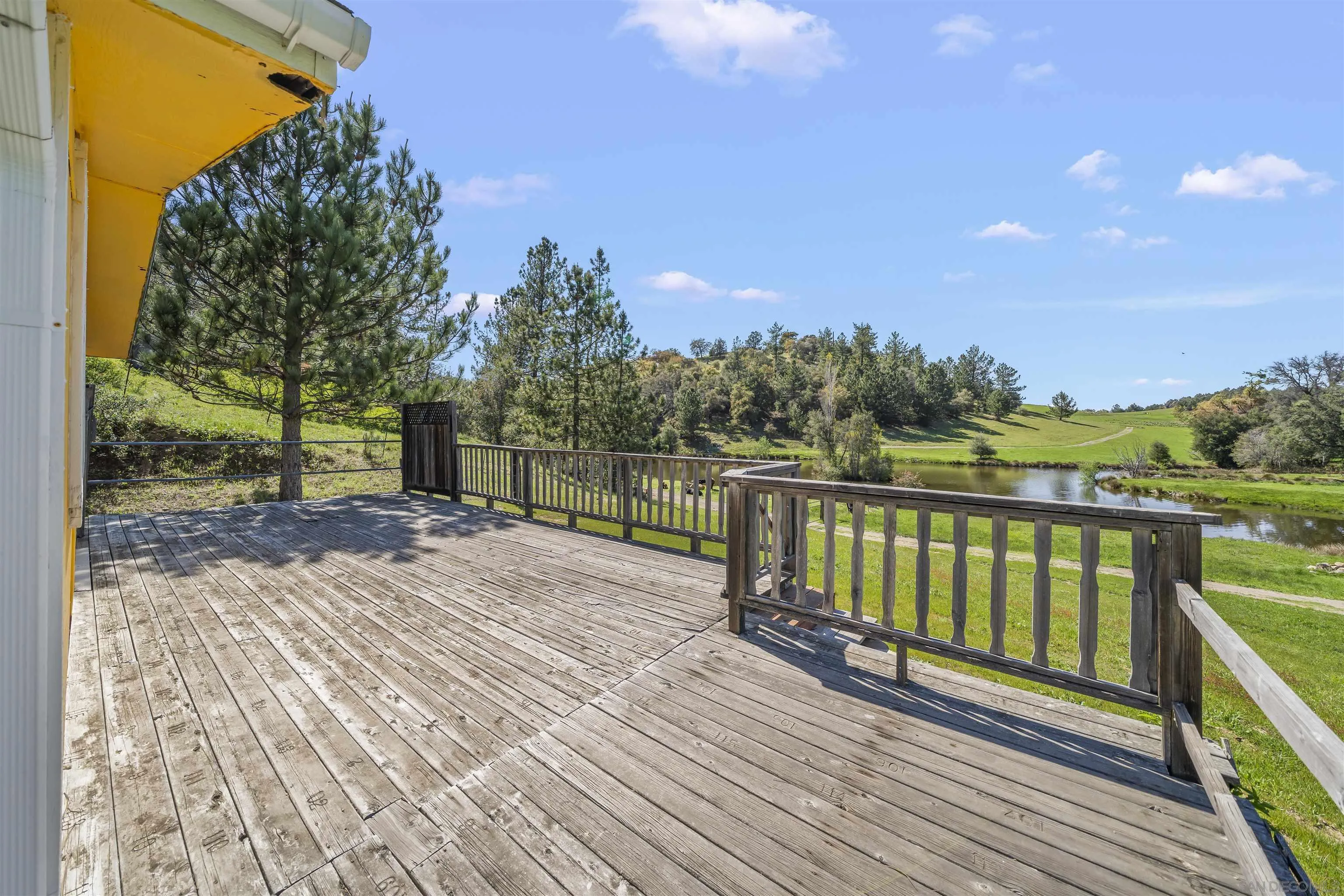 2464 Wynola Road Julian, CA 92036 - Photo 37 of 50 a view of a street with a wooden bridge