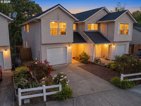 a house view with a garden space