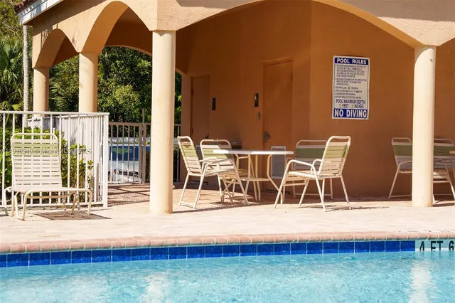 a view of a park with palm trees
