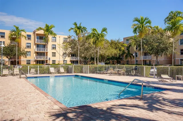 a view of house with porch and outdoor seating