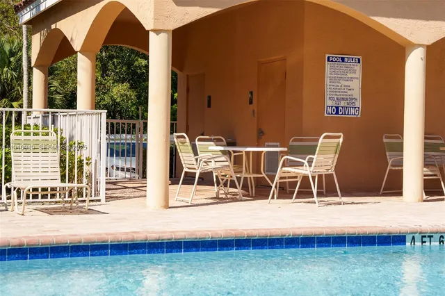 a view of a park with palm trees