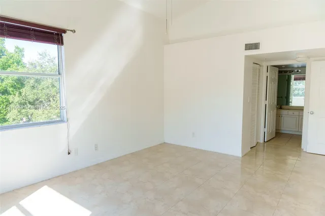 an empty room with a window