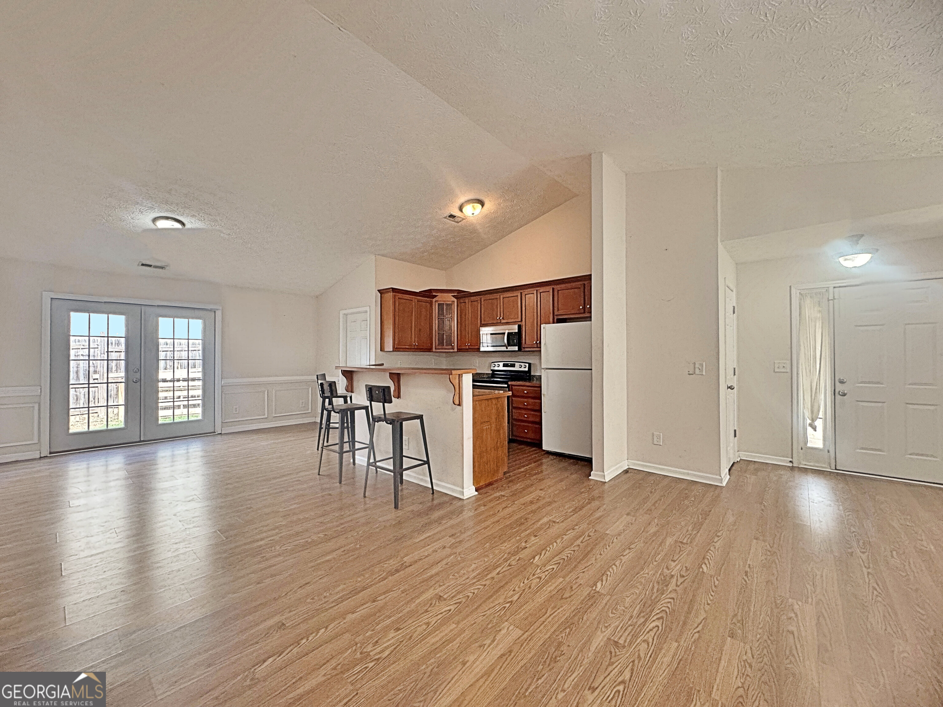 203 Jerry Road Hogansville, GA 30230 - Photo 15 of 51 a view of kitchen with cabinets and wooden floor