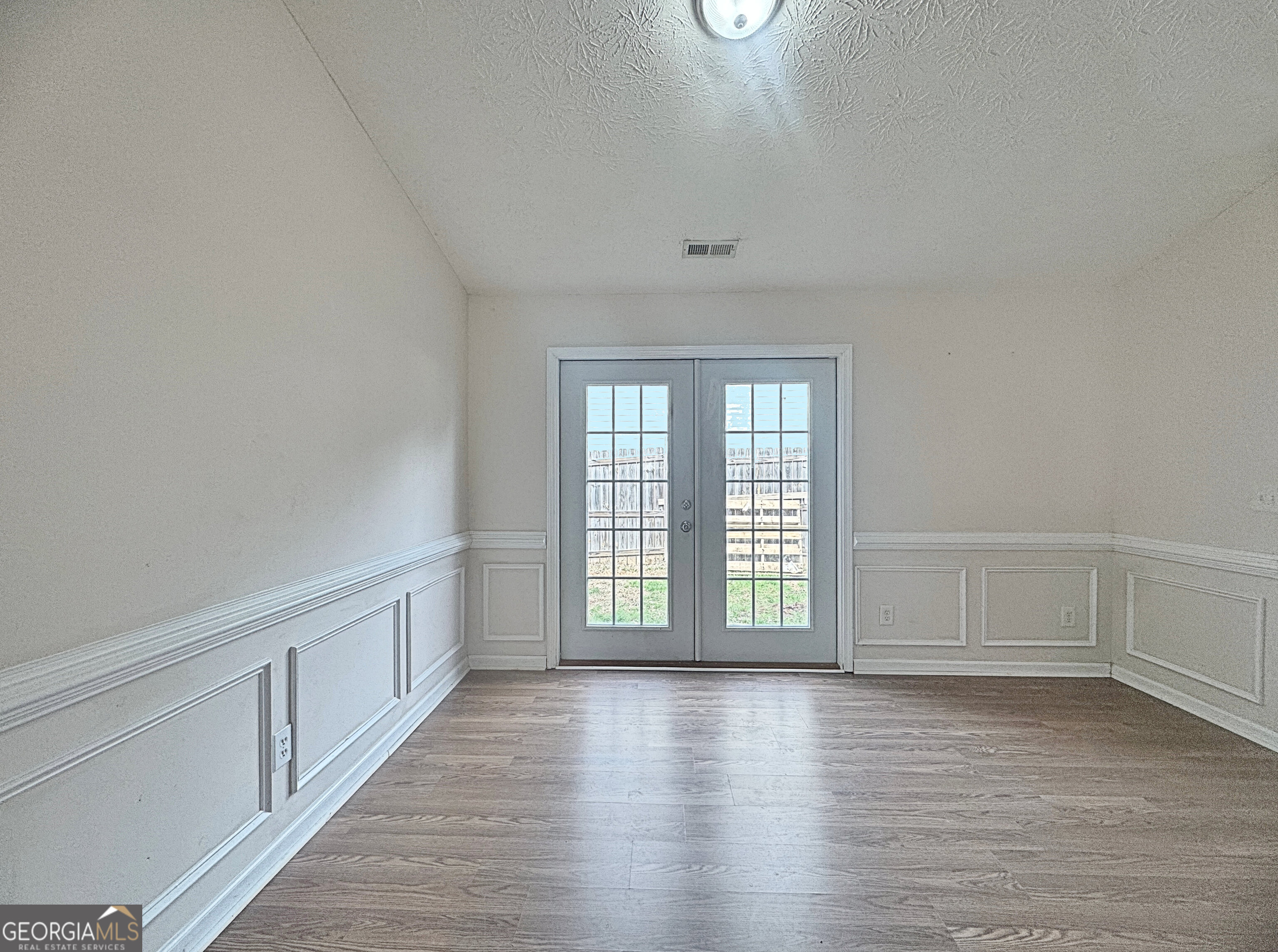 203 Jerry Road Hogansville, GA 30230 - Photo 16 of 49 wooden floor in an empty room with a window