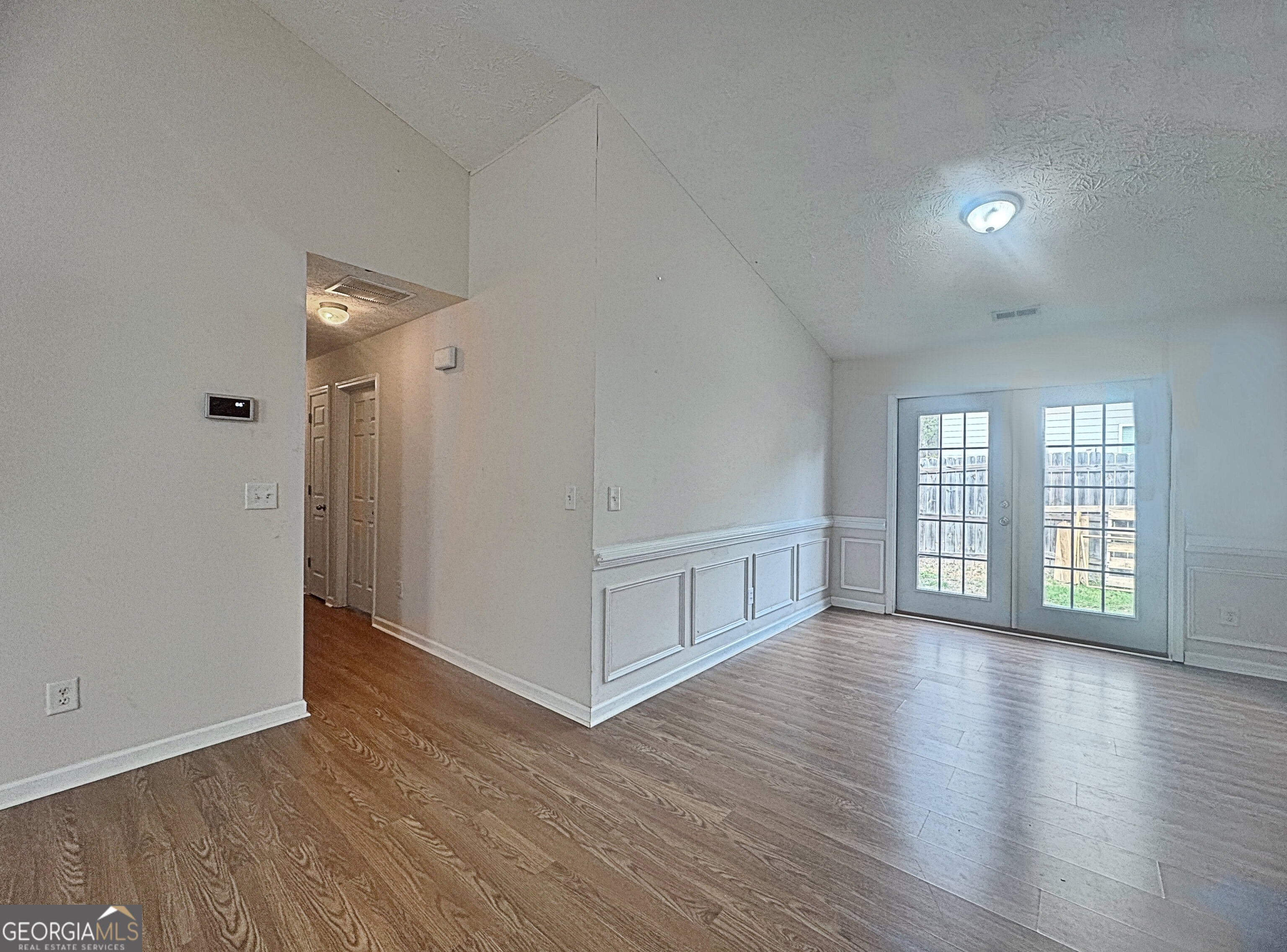 203 Jerry Road Hogansville, GA 30230 - Photo 17 of 51 wooden floor in an empty room with a window