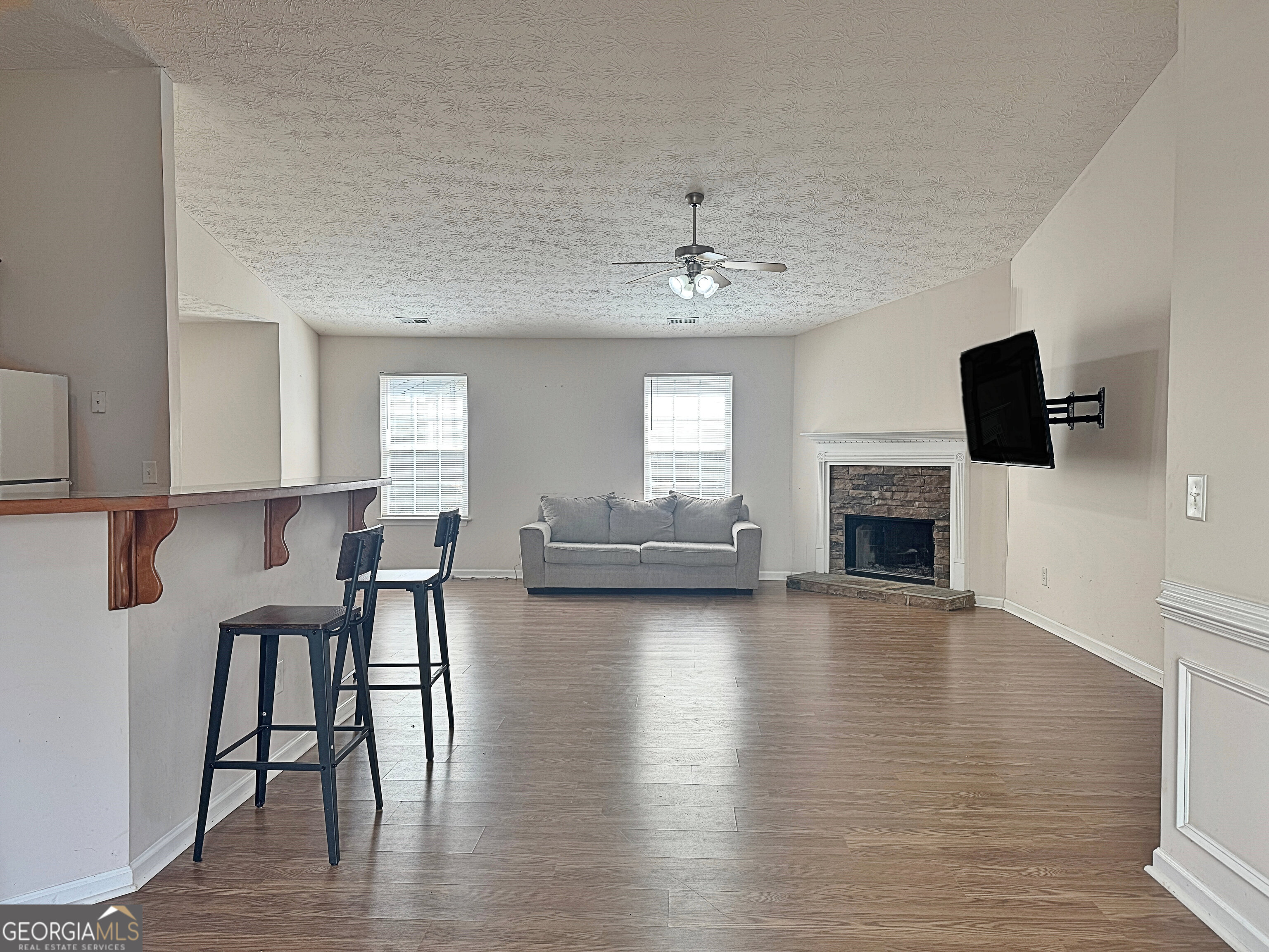 203 Jerry Road Hogansville, GA 30230 - Photo 21 of 51 a living room with furniture and a fireplace or television