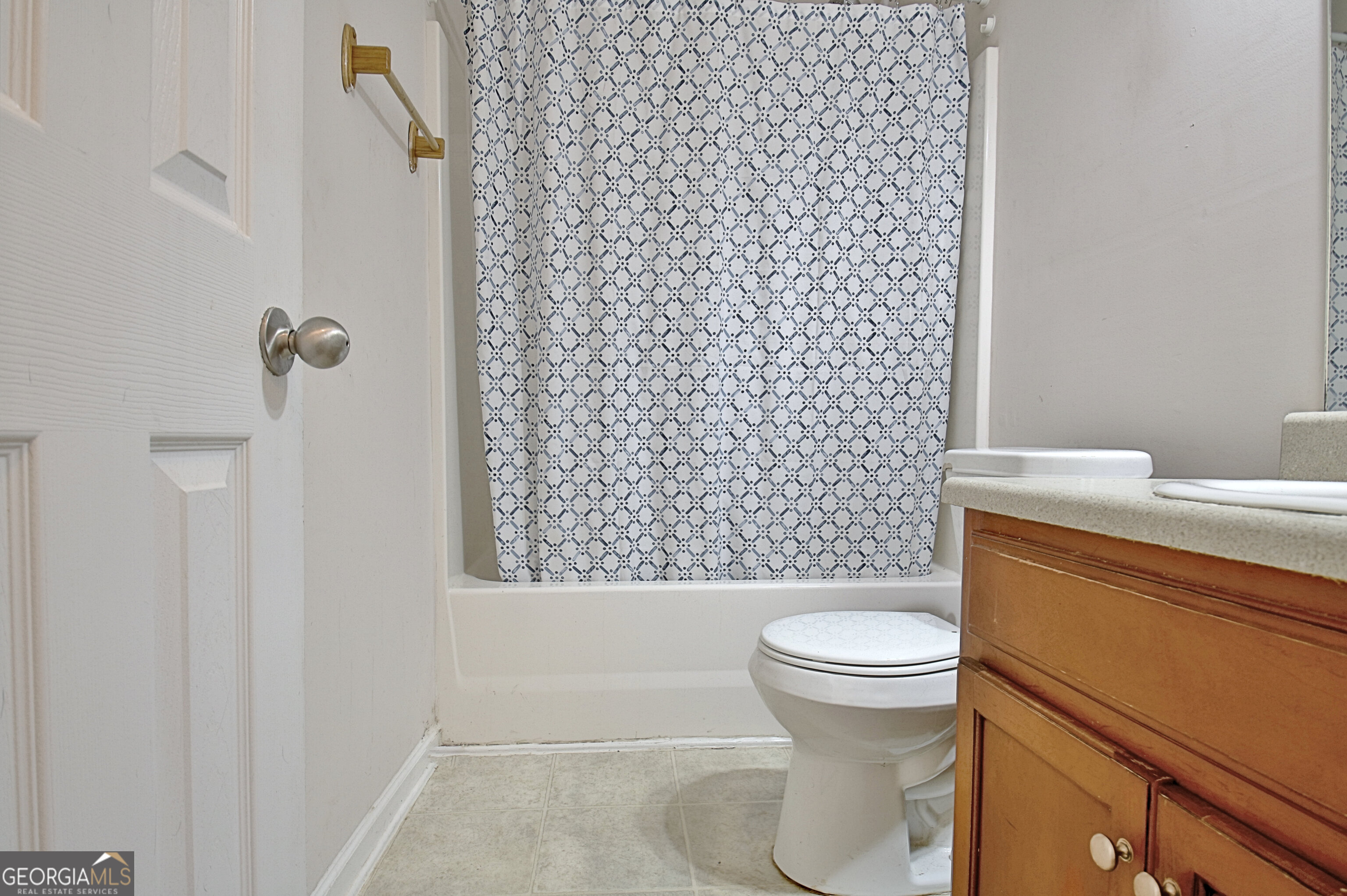 203 Jerry Road Hogansville, GA 30230 - Photo 25 of 51 a white toilet sitting next to a bathroom sink