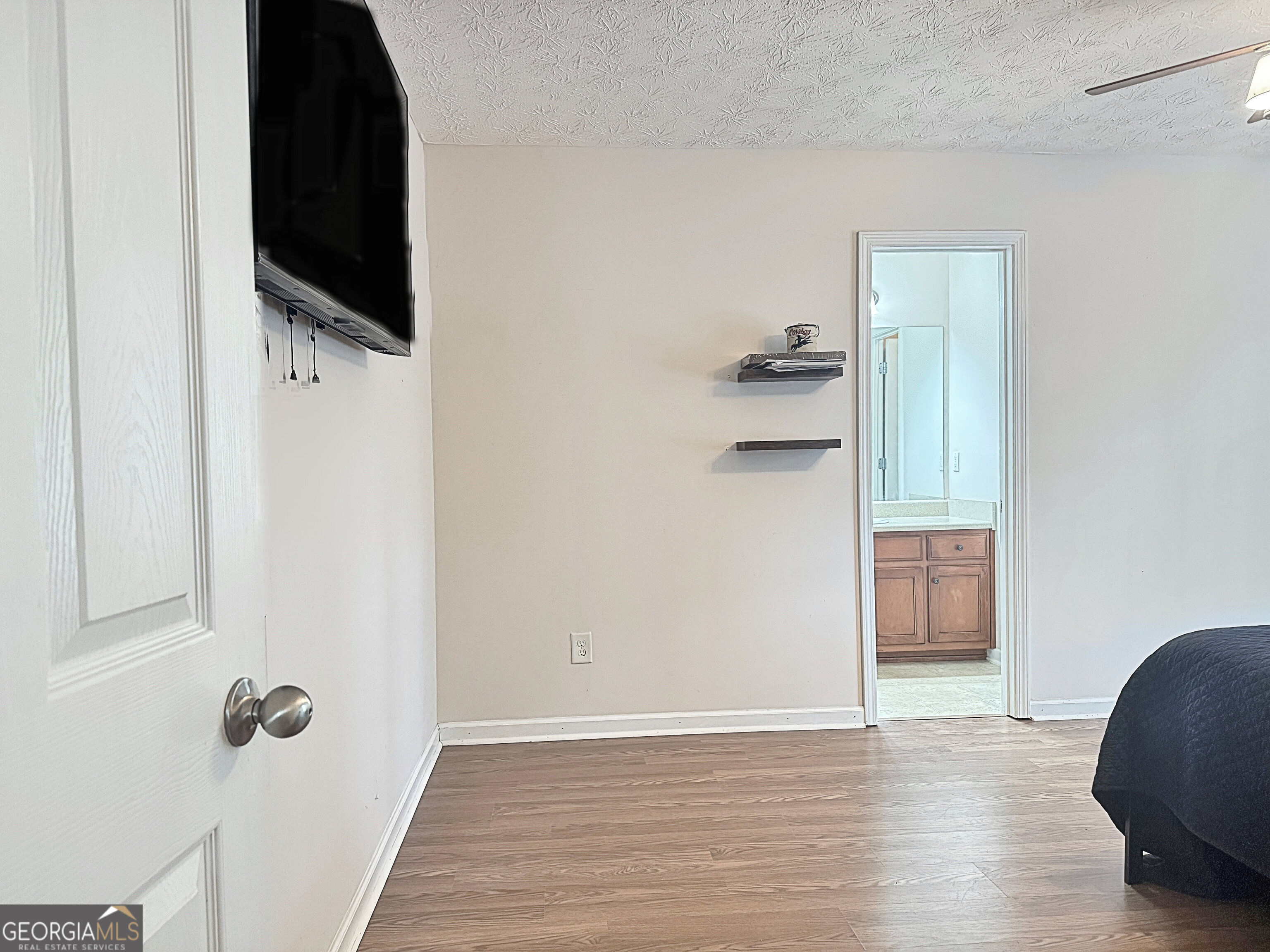 203 Jerry Road Hogansville, GA 30230 - Photo 27 of 49 a view of a workspace with wooden floor and closet