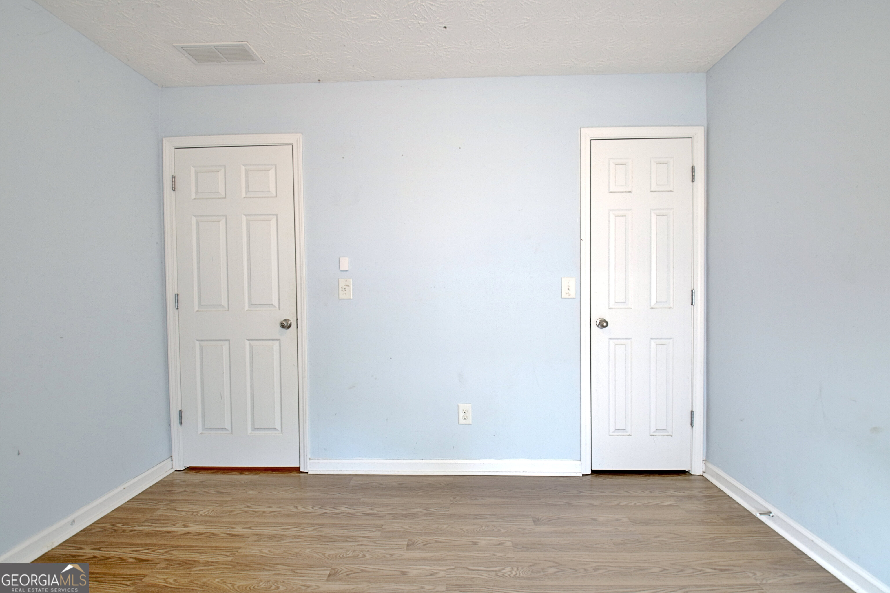 203 Jerry Road Hogansville, GA 30230 - Photo 28 of 51 a view of an empty room with wooden floor