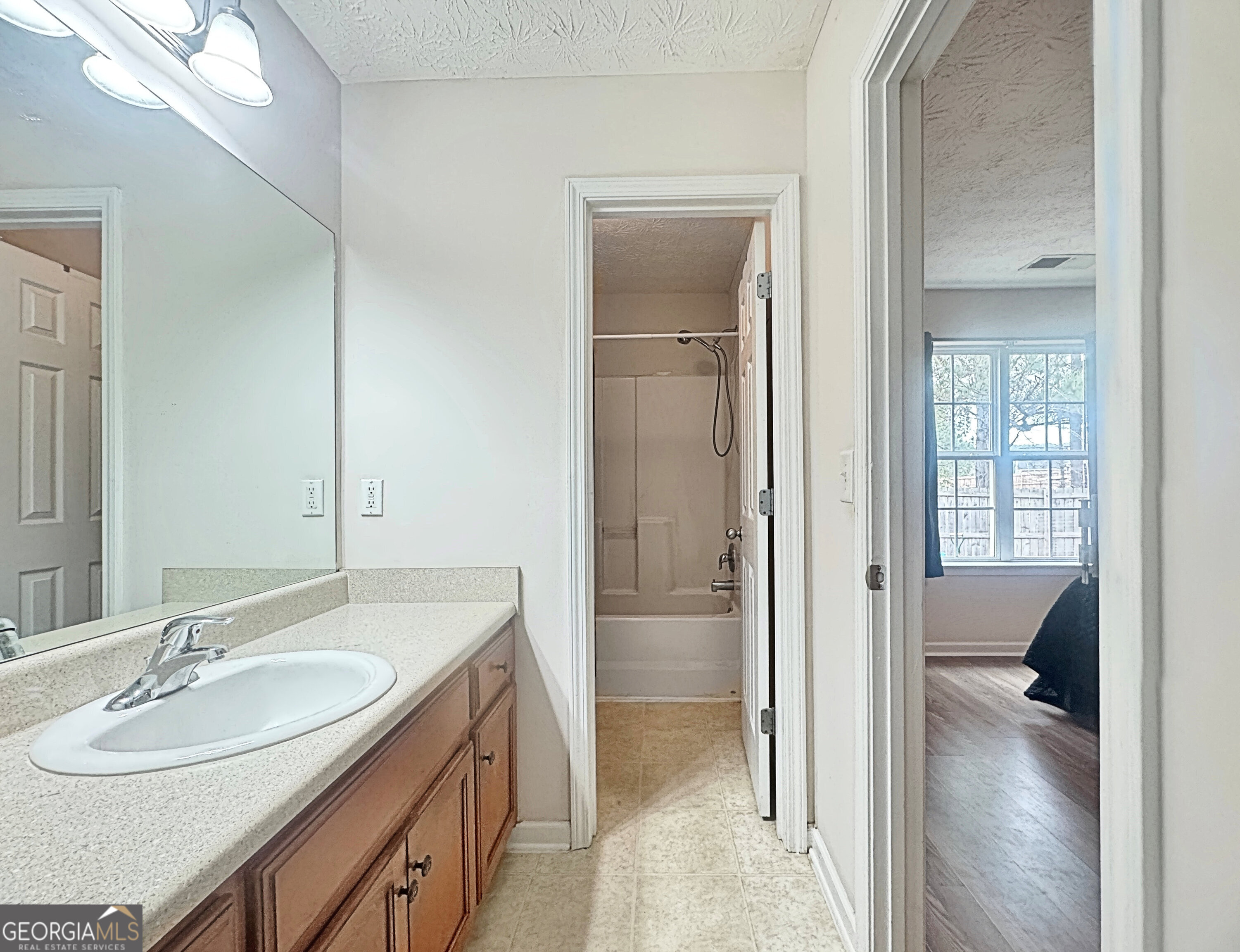203 Jerry Road Hogansville, GA 30230 - Photo 33 of 49 a bathroom with a sink and a mirror