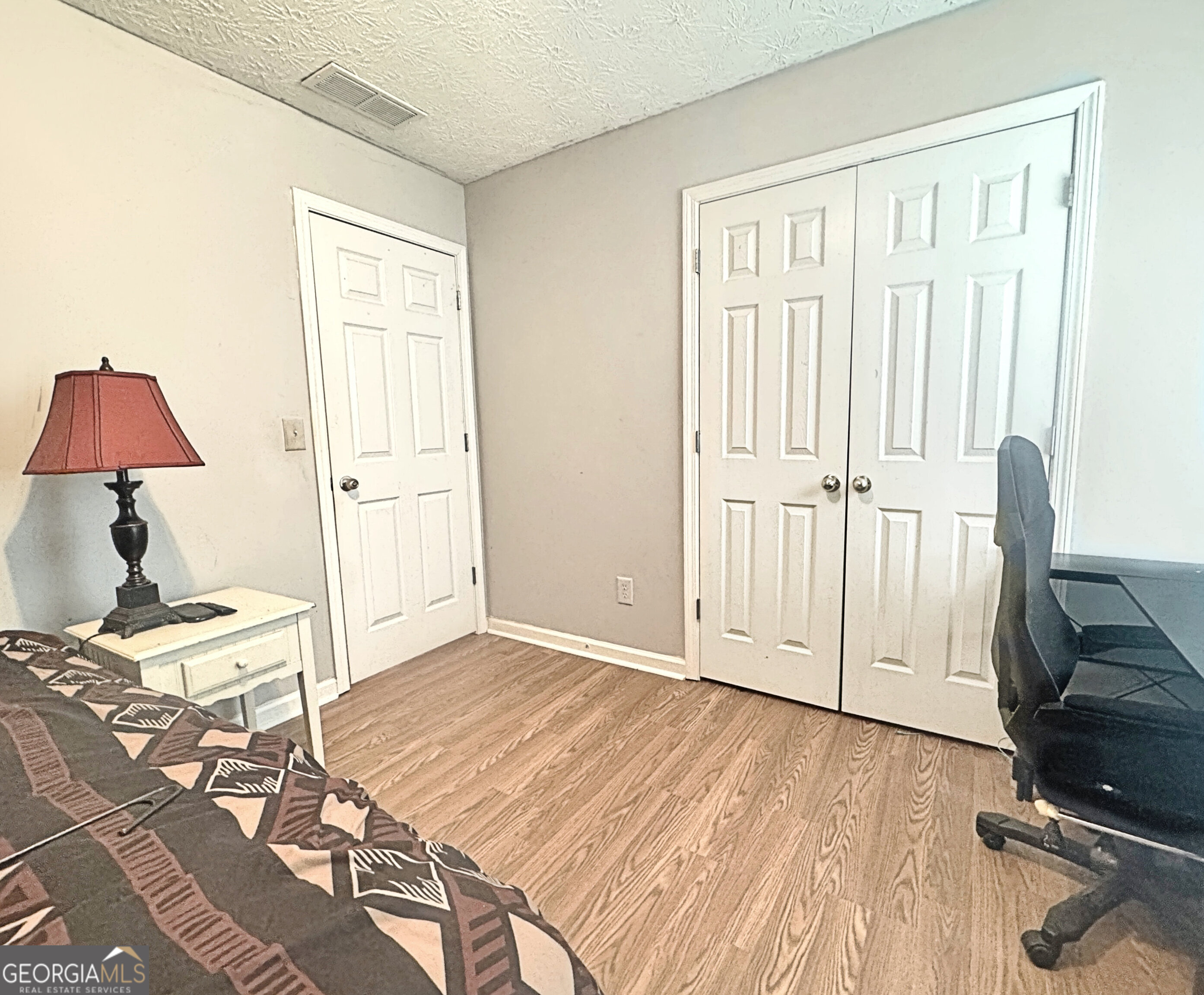 203 Jerry Road Hogansville, GA 30230 - Photo 39 of 51 a view of a livingroom with wooden floor and white walls