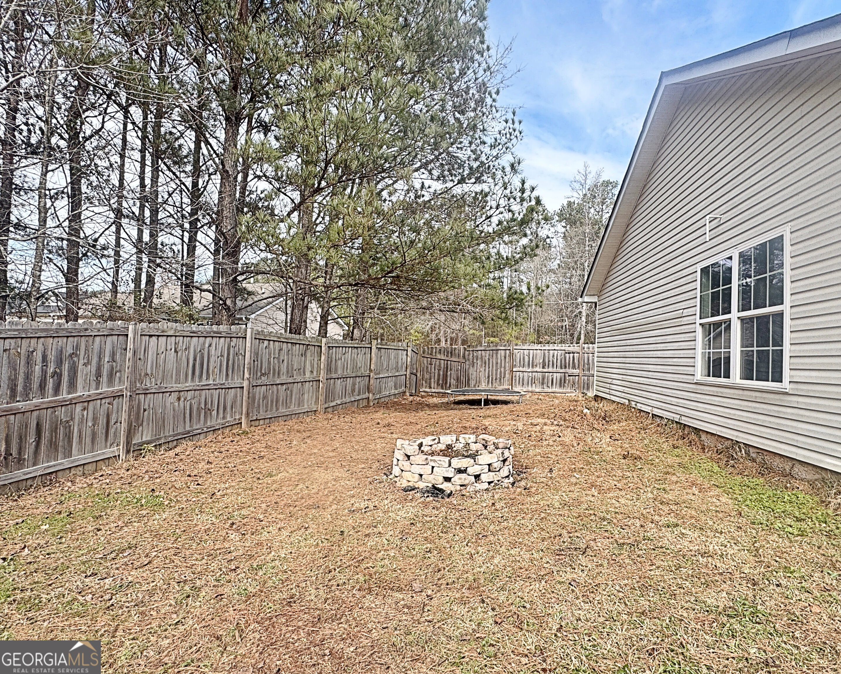 203 Jerry Road Hogansville, GA 30230 - Photo 40 of 49 a view of backyard with wooden fence