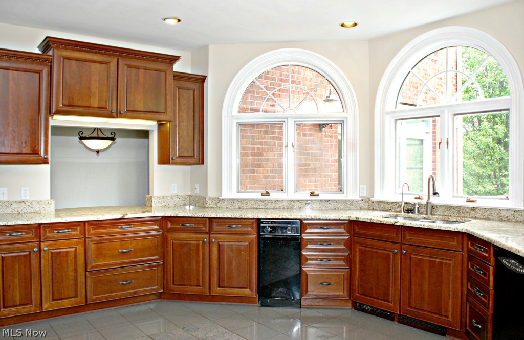 2890 Roundhill Road Akron, OH 44333 - Photo 10 of 25 CHERRY KITCHEN WITH GRANITE COUNTER TOPS, LARGE PANTRIES, RECESSED LIGHTING