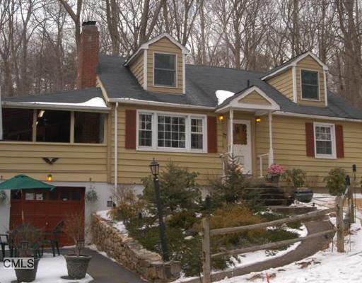 77 Old Dike Road Trumbull, CT 06611 - Photo 1 of 1 a front view of a house with garden