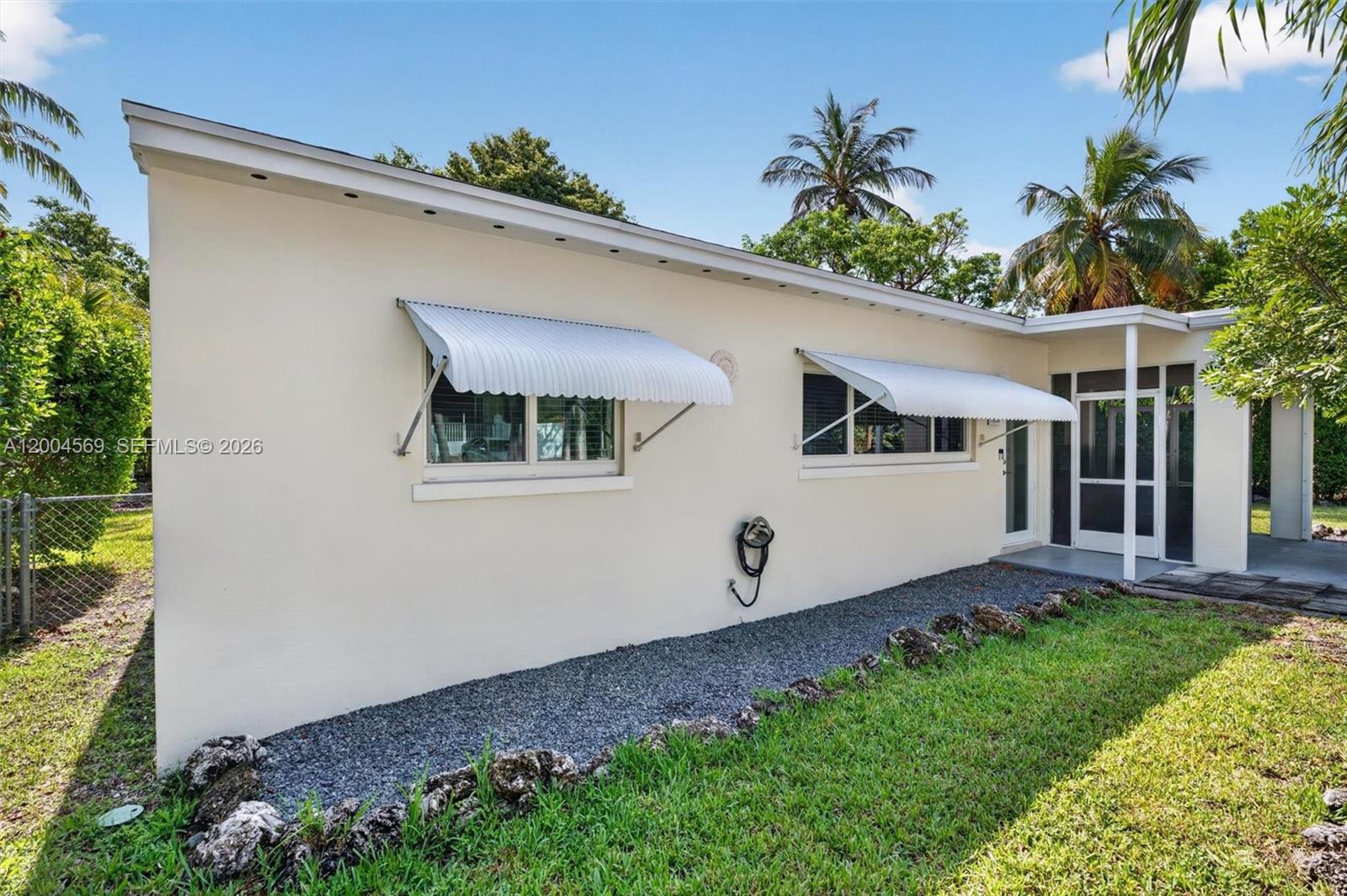 8 Ocean View Boulevard Key Largo, FL 33037 - Photo 4 of 56 Picture-perfect cottage with timeless Florida charm.