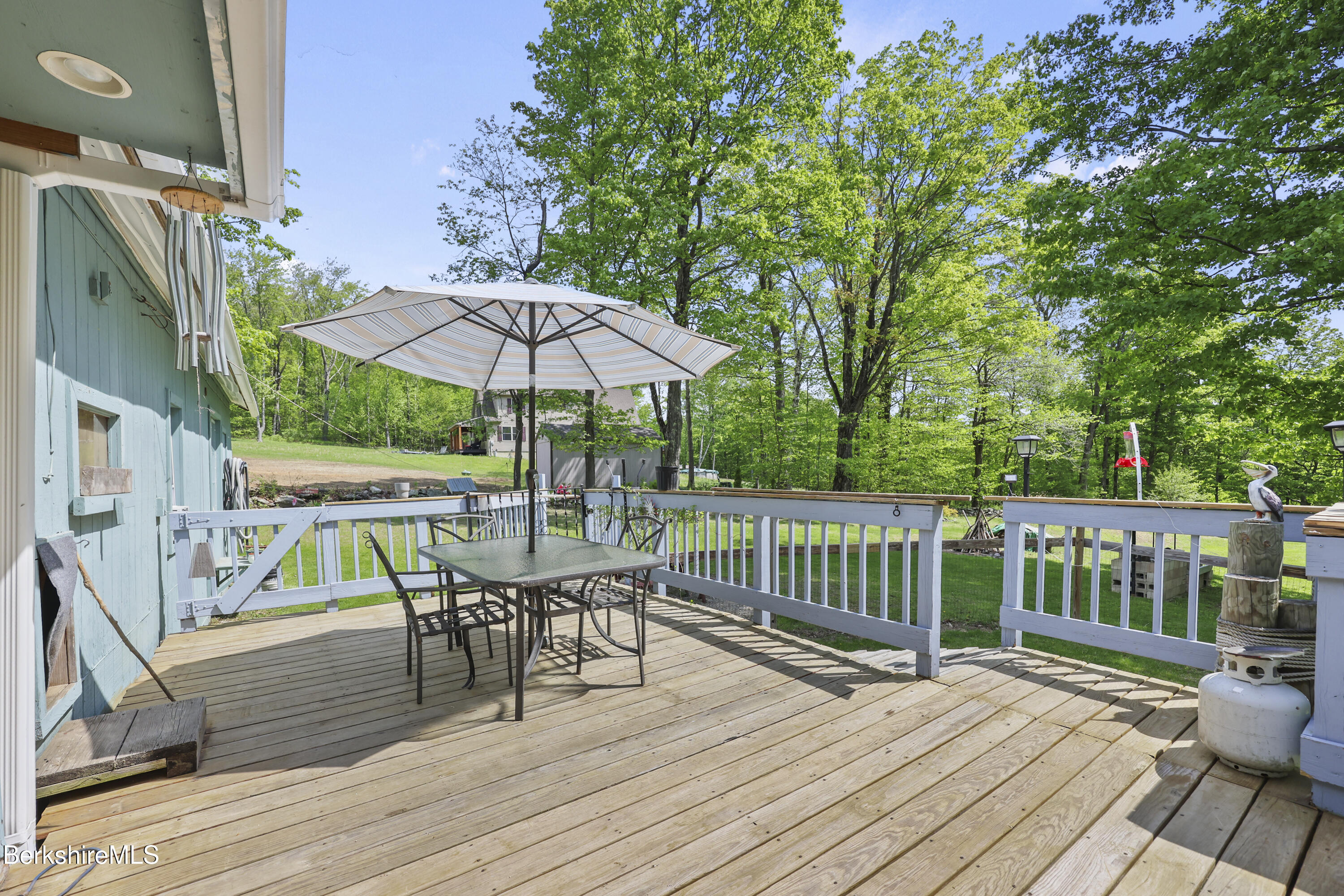 192 Curran Road Cheshire, MA 01225 - Photo 33 of 50 a view of a chair and table on the wooden floor