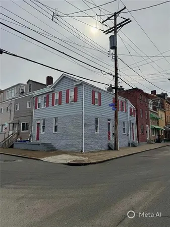 a view of a building with a street