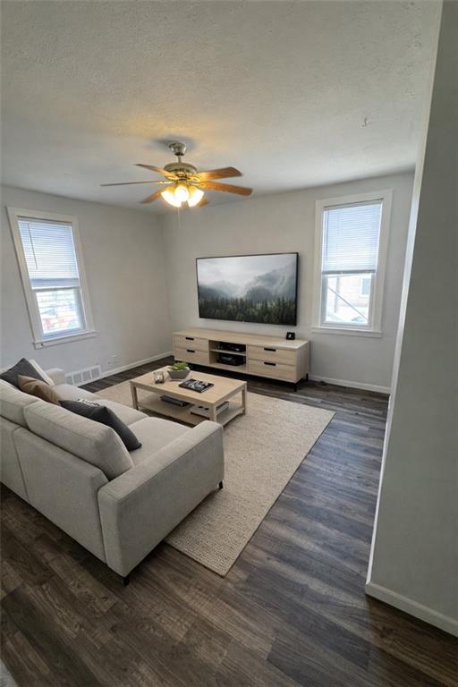 67 South 17th Street Pittsburgh, PA 15203 - Photo 3 of 9 a living room with furniture and a flat screen tv