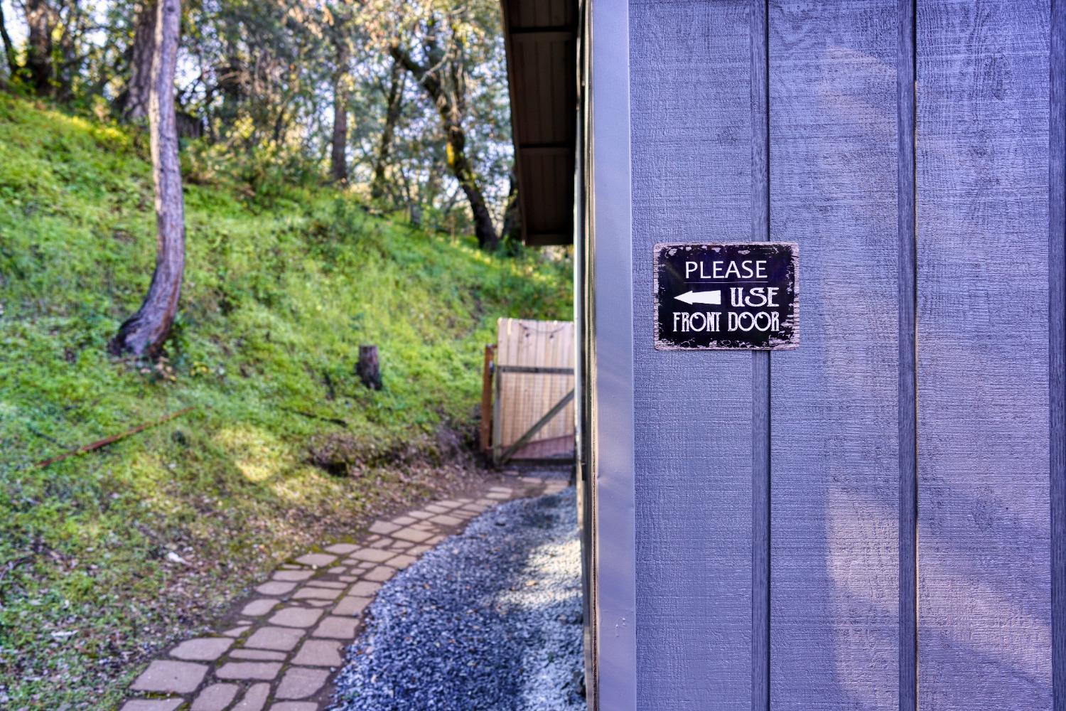 42917 Scenic Drive Oakhurst, CA 93644 - Photo 30 of 50 a view of a door and chair