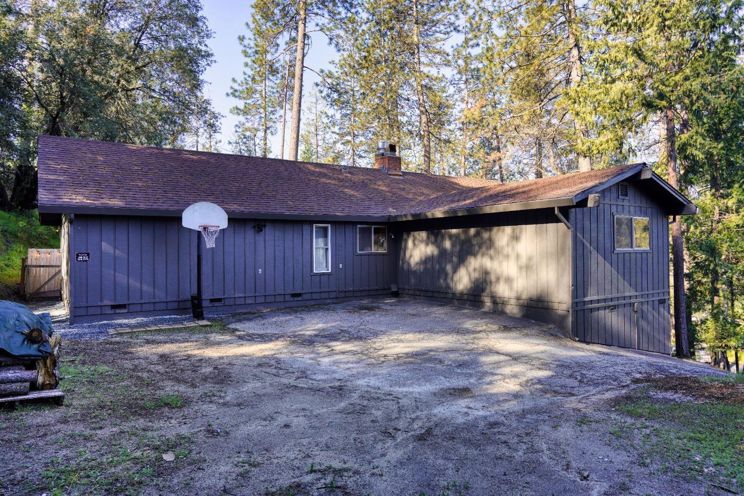 42917 Scenic Drive Oakhurst, CA 93644 - Photo 34 of 50 a view of a house with a yard