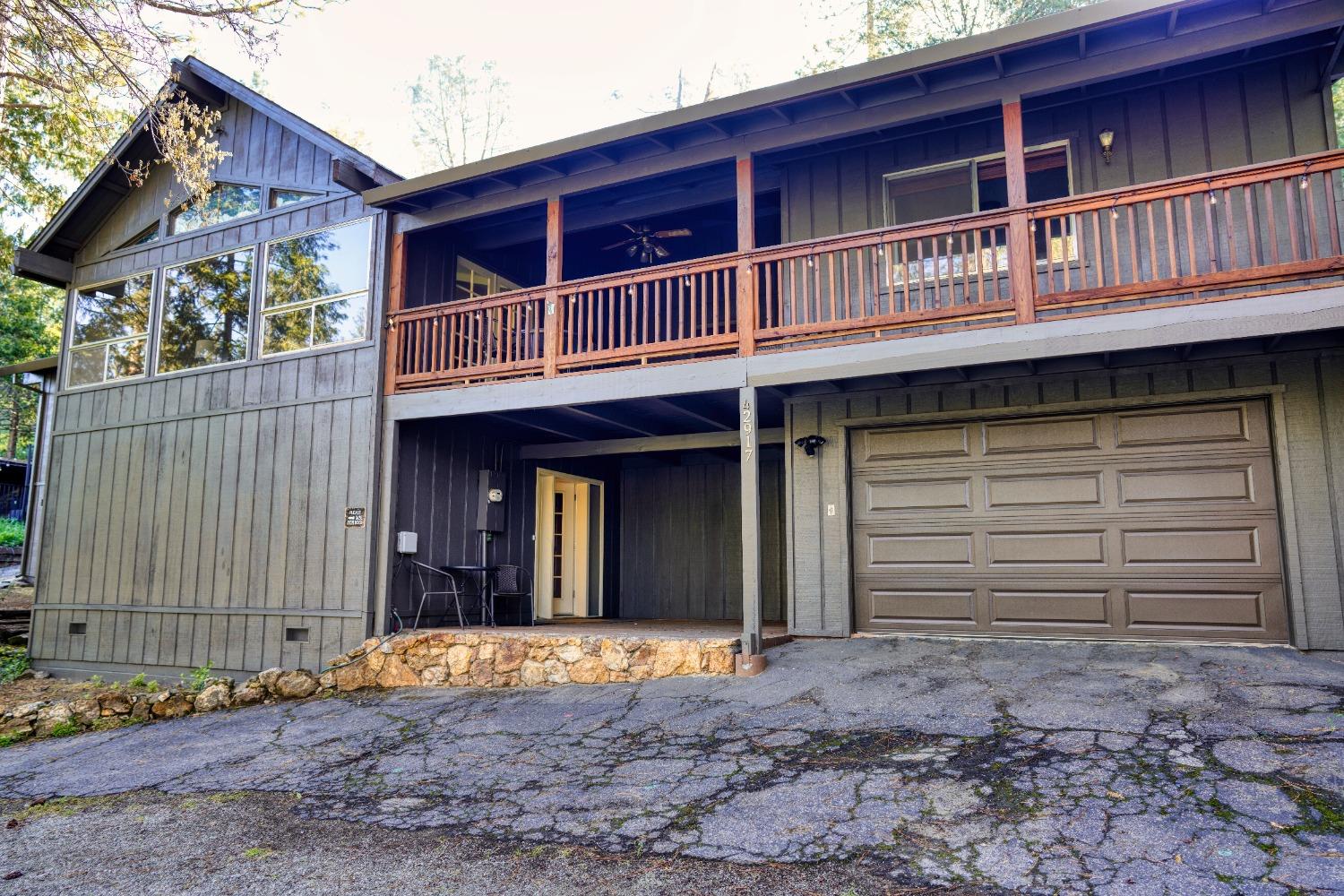 42917 Scenic Drive Oakhurst, CA 93644 - Photo 36 of 50 a view of a house with a balcony